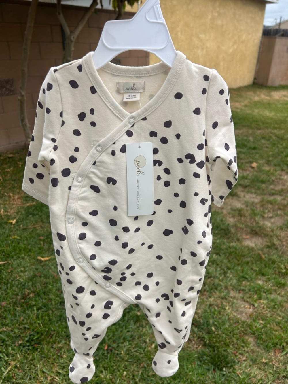 Peek Infant Footed Romper in Ivory with Black Spot Print
